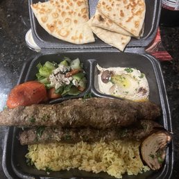 Kabob, salad, hummus and rice Kabob, salad, hummus and rice