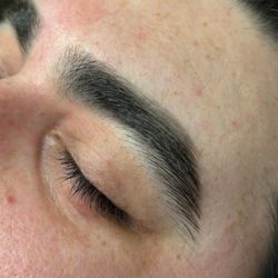 Men's eyebrow wax clean up. includes waxing, trimming, & tweezing. $25