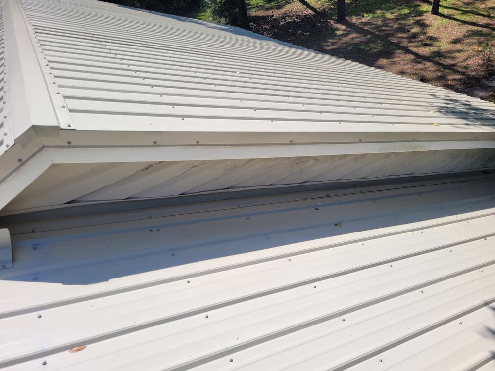 Slide of Moore Elite Roofing