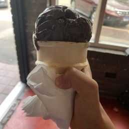 Single scoop of Zanzibar chocolate ice cream in a cake cone Single scoop of Zanzibar chocolate ice cream in a cake cone