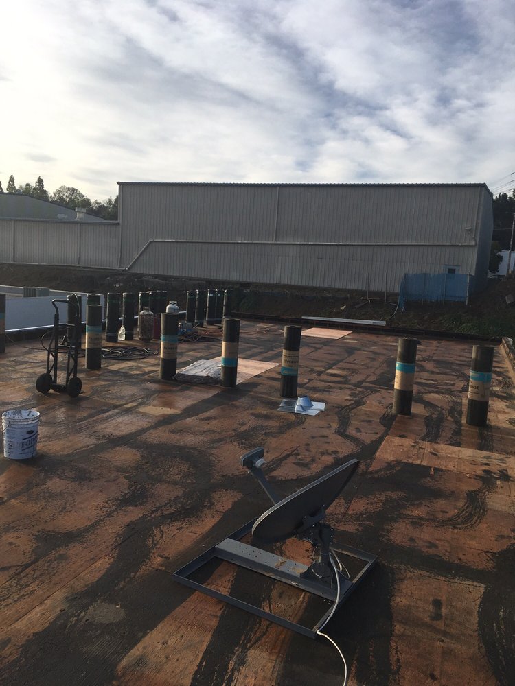 Slide of Vulcan Roofing Co