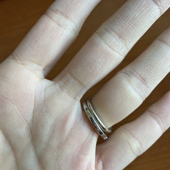 Brilliant Earth - White gold finish wearing away to yellow (top ring). - Jewelry Near Me - Boston, Massachusetts