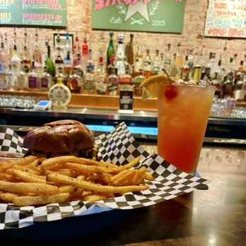 Badd Burgers - McBaddy, Seasoned Fries from Badd Burgers & a signature cocktail from Strummer's. - Burgers Near Me - Fresno, California Badd Burgers - McBaddy, Seasoned Fries from Badd Burgers & a signature cocktail from Strummer's. - Burgers Near Me - Fresno, California