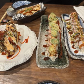EBISU - Our 4 rolls Volcano Roll Diiner (left) Lion King Roll (top left) Hot Snow White Roll (next to volcano) San Juan roll (right) - Japanese Near Me - Elk Grove, California