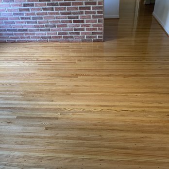 Abbazia Flooring - a hardwood floor in a living room - Flooring Near Me