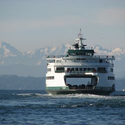 Olympic Exchange Accommodators - Washington state ferry safely transporting people from one shore to another.