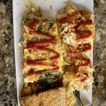 Mamas Kitchen - Greek omelette with home fries and rye toast. Huge plate of food for a great price and delicious! - Breakfast & Brunch Near Me - Seminole, Florida