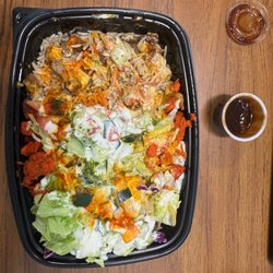 Shah's Halal Food - Lamb and Chicken over rice with salad.