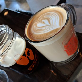 Ginger Beard Coffee - Latte (left) and cold peanut butter coffee. - Coffee & Tea Near Me - Tampa, Florida