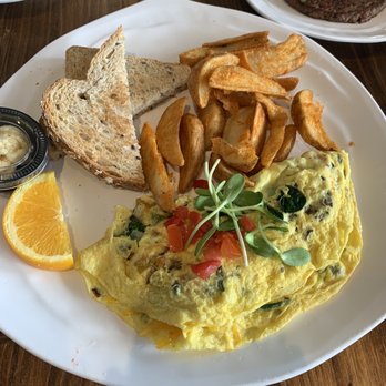 Revelations Cafe - Garden omelet, potato wedges, Sprouted Toast - Breakfast & Brunch Near Me - Lutz, Florida