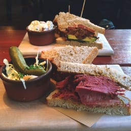 Pastrami with pulled pork behind it