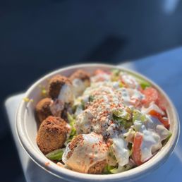Falafel Bowl with extra cucumbers and sauce