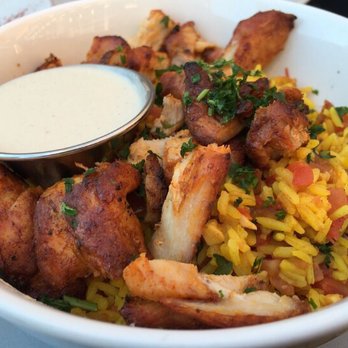 Oren's Hummus - Chicken Rice Bowl w/ simmered tomatoes, garlic, onions, mint, parsley, tahini | $13.50 - Mediterranean Near Me - Cupertino, California