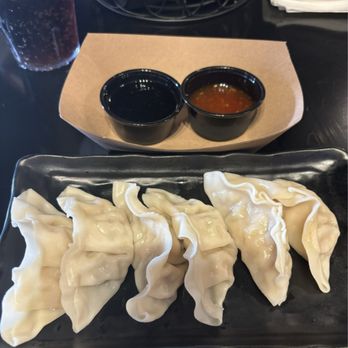 Kings Lake Grille - Steamed Chicken Gyoza pared with two different sauces. They also come fried. - Ramen Near Me - Gibsonton, Florida Kings Lake Grille - Steamed Chicken Gyoza pared with two different sauces. They also come fried. - Ramen Near Me - Gibsonton, Florida
