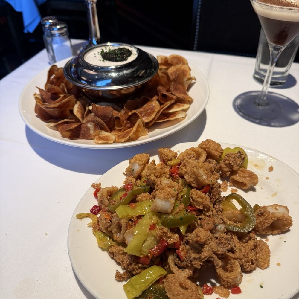 Pan-Fried Calamari with Hot Cherry Peppers and Caviar and Caramelized Onion Dip with Housemade Chips Pan-Fried Calamari with Hot Cherry Peppers and Caviar and Caramelized Onion Dip with Housemade Chips