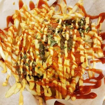 The ToreOre - kimchi fries - Chicken Wings Near Me - Houston, Texas The ToreOre - kimchi fries - Chicken Wings Near Me - Houston, Texas