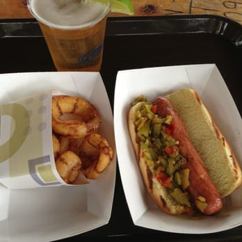 Purgy's The Bear Bar - 1/4 pound Nathan's original all beef hot dog with hot green chili, small order of onion rings, cold Mexican logger. Tasty! - Hot Dogs Near Me - Durango, Colorado Purgy's The Bear Bar - 1/4 pound Nathan's original all beef hot dog with hot green chili, small order of onion rings, cold Mexican logger. Tasty! - Hot Dogs Near Me - Durango, Colorado