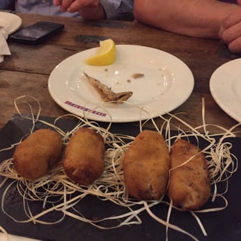 Ultramarinos - Filled with jamon de Jabugo. - Tapas Bars Near Me - Barcelona, B Ultramarinos - Filled with jamon de Jabugo. - Tapas Bars Near Me - Barcelona, B