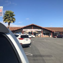 East Lake Food and Liquor - East Lake Food Liquors.  Weird experience. My take is the guy behind counter thought I should be subservient to him.  Try again.