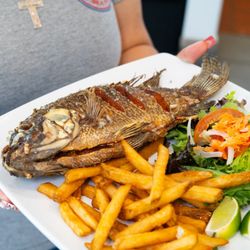 Shrimp and Tails Seafood - Mojarra Frita with salad