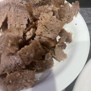 Hibiscus Cafe - Side of Gyro meat for my salad, it was dried out but good flavor. - Greek Near Me - Wichita Falls, Texas Hibiscus Cafe - Side of Gyro meat for my salad, it was dried out but good flavor. - Greek Near Me - Wichita Falls, Texas