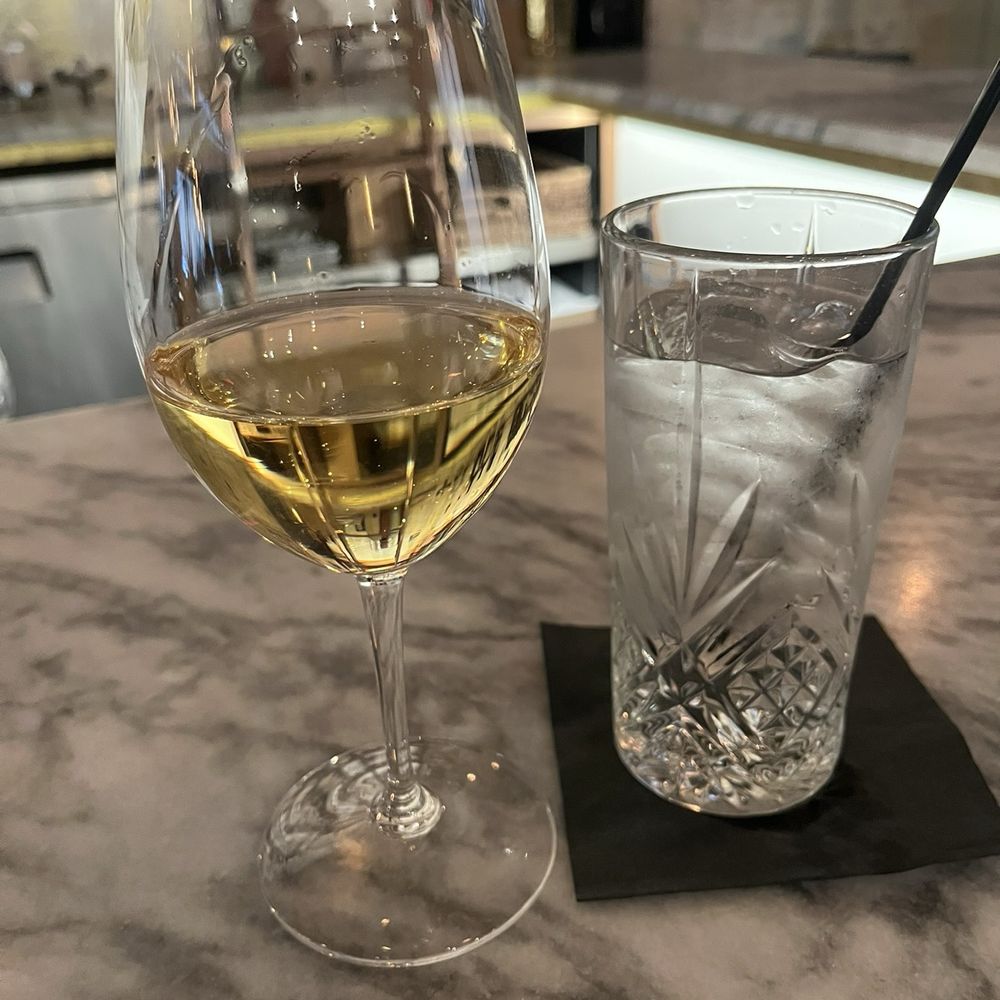 French Hen - Sipping Chardonnay at French Hen Tulsa Arts District - French Near Me - Tulsa, Oklahoma