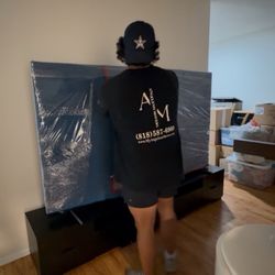 Angeleno Movers - Unwrapping big Sony TV - 90+ inch in my new home. Safe!