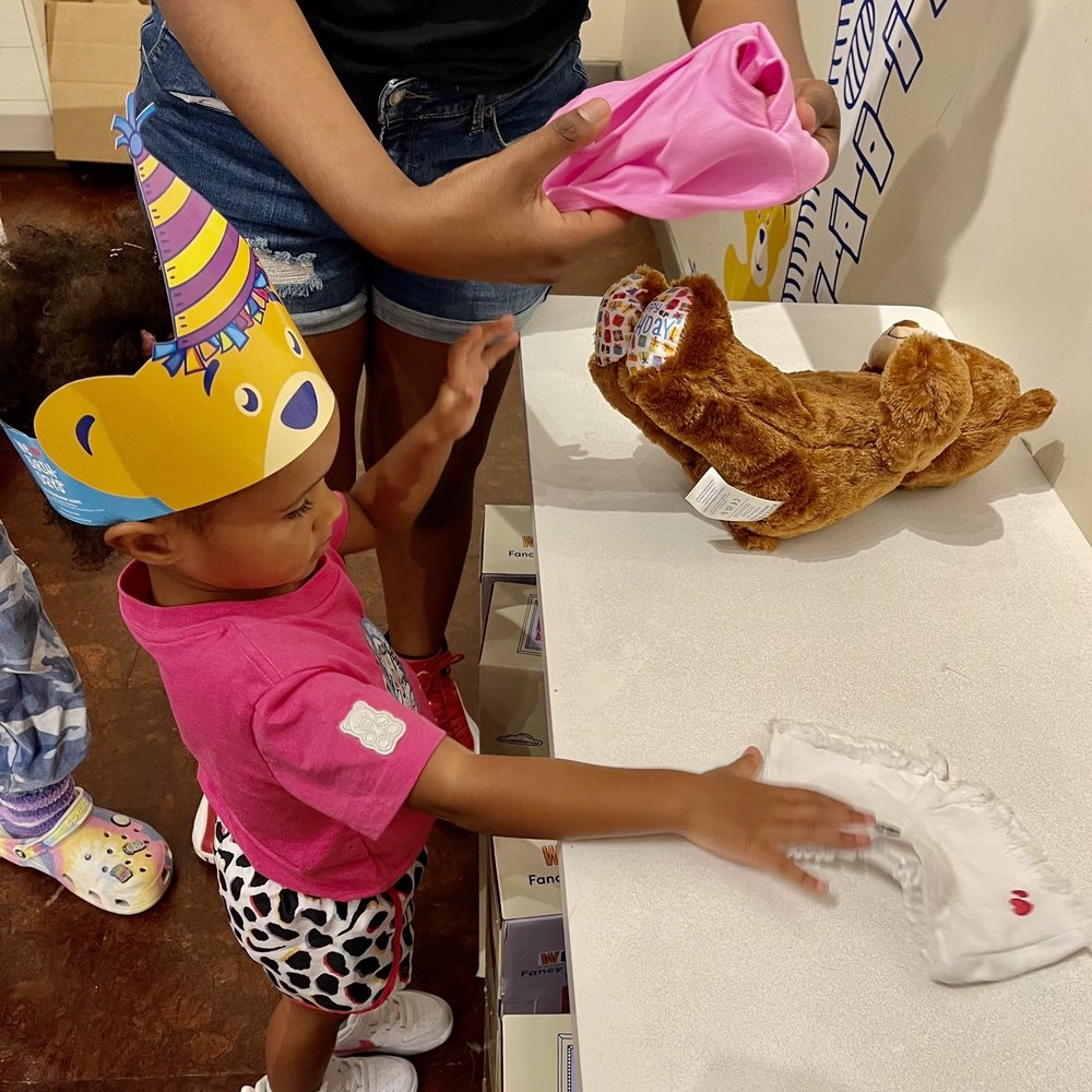 Build-A-Bear Workshop - Dressing her friend - Toy Stores Near Me - Orlando, Florida Build-A-Bear Workshop - Dressing her friend - Toy Stores Near Me - Orlando, Florida