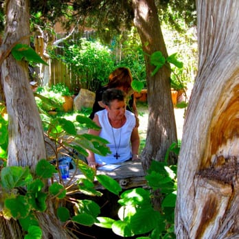ChocolaTree - looking through the table...in the garden. - Vegetarian Near Me - Sedona, Arizona