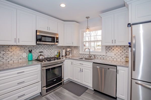 Marinello Carpentry Logo