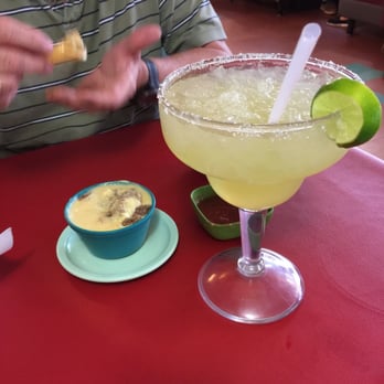 Fiesta Grill - Large margarita and cheese dip with ground beef. - Mexican Near Me - Ennis, Texas