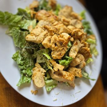 Mega Tom's Burgers - Chicken Cesar salad. A ton of grilled chicken - Burgers Near Me - Murrieta, California Mega Tom's Burgers - Chicken Cesar salad. A ton of grilled chicken - Burgers Near Me - Murrieta, California