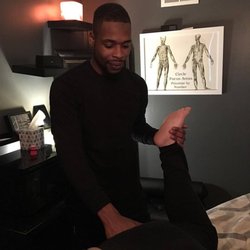 Oliver performing a glute stretch