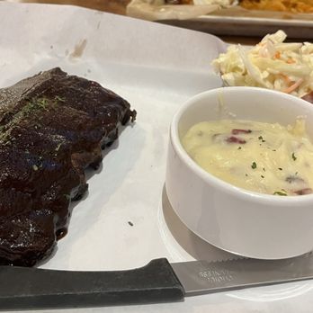 The Quarry Taphouse - Half rack of ribs with mashed potatoes and coleslaw. - Sports Bars Near Me - Hastings, Minnesota