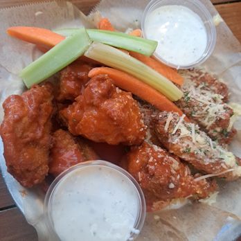 Saucy Mama's - Half spicy half parmesan large size wings - Pizza Near Me - Big Bear Lake, California Saucy Mama's - Half spicy half parmesan large size wings - Pizza Near Me - Big Bear Lake, California