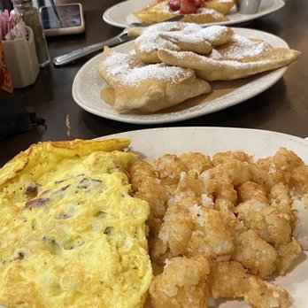 Syrup Downtown - The tots were light and fluffy. Napoleon Dynamite approved! That omelet was GREAT! - Breakfast & Brunch Near Me - Denver, Colorado Syrup Downtown - The tots were light and fluffy. Napoleon Dynamite approved! That omelet was GREAT! - Breakfast & Brunch Near Me - Denver, Colorado