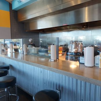 Rusty Taco - You can sit and watch ten make your food but I don't suggest doing it.  The 2 employees were lazy - Tex-Mex Near Me - Gilbert, Arizona