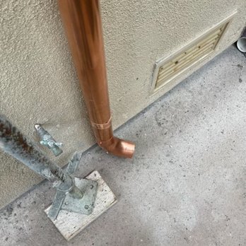 Aesthetic Rain Gutter - Custom copper downspout and elbow to push water away. - Gutter Services Near Me Aesthetic Rain Gutter - Custom copper downspout and elbow to push water away. - Gutter Services Near Me