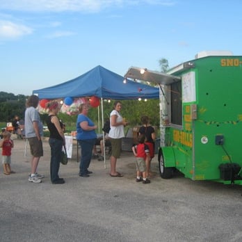 Top G's Sno Cones & Roasted Corn - a group of people standing around a food truck - Ice Cream & Frozen Yogurt Near Me - Austin, Texas Top G's Sno Cones & Roasted Corn - a group of people standing around a food truck - Ice Cream & Frozen Yogurt Near Me - Austin, Texas