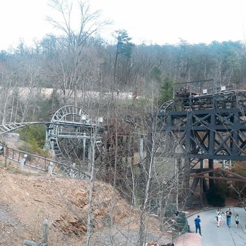 Mystery Mine - The horseshoe turn seen here at photo center. Most of Mystery Mine takes place indoors, but this outdoor section is fun too! - Amusement Parks Near Me - Pigeon Forge, Tennessee Mystery Mine - The horseshoe turn seen here at photo center. Most of Mystery Mine takes place indoors, but this outdoor section is fun too! - Amusement Parks Near Me - Pigeon Forge, Tennessee