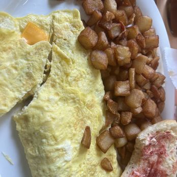 T-Ville Diner - Cheese omelette, add mushrooms, and home fries with a biscuit - Diners Near Me - Thomasville, North Carolina T-Ville Diner - Cheese omelette, add mushrooms, and home fries with a biscuit - Diners Near Me - Thomasville, North Carolina