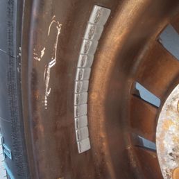1st gouge and obvious rubbing on the wheel weights. The ledge closest to the hub is the only safe place to attach weights!
