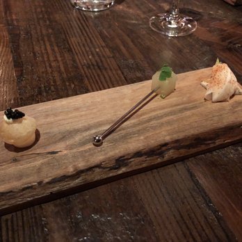 Three Blacksmiths - Potato puff with caviar, compressed melon, Asian pear wrapped in turnip and dusted with house smoked paprika. - French Near Me - Sperryville, Virginia Three Blacksmiths - Potato puff with caviar, compressed melon, Asian pear wrapped in turnip and dusted with house smoked paprika. - French Near Me - Sperryville, Virginia