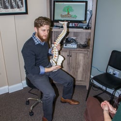 Embrace Life Chiropractic - Dr. Erik explaining the nervous system to a new patient