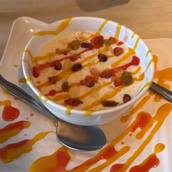 Raj Saffron House - Kheer - Indian rice pudding made with milk, almonds, raisins and rosewater. Every spoonful was a delight!! - Indian Near Me - Syracuse, New York Raj Saffron House - Kheer - Indian rice pudding made with milk, almonds, raisins and rosewater. Every spoonful was a delight!! - Indian Near Me - Syracuse, New York