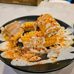 The Empanada Lady - The street corn was the highlight of the visit.