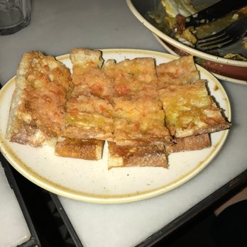 Tantarantana - Tomato and bread with delicious olive oil drizzled on top... a staple among tapas made well! - Spanish Near Me - Barcelona, B Tantarantana - Tomato and bread with delicious olive oil drizzled on top... a staple among tapas made well! - Spanish Near Me - Barcelona, B