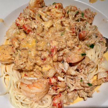 Eslava's Grille - The Seafood Pasta...crawfish, shrimp, crabmeat and scallops mixed with a white cream sauce over angel hair pasta. Delicious!! - Specialty Food Near Me - Flowood, Mississippi