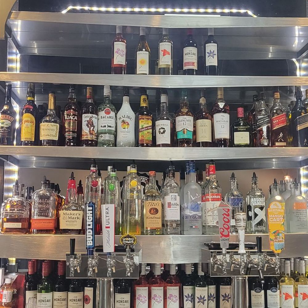 Happy Hours Bar & Grill - The Bar is stocked with whatever you like. - Sports Bars Near Me - Lancaster, California Happy Hours Bar & Grill - The Bar is stocked with whatever you like. - Sports Bars Near Me - Lancaster, California