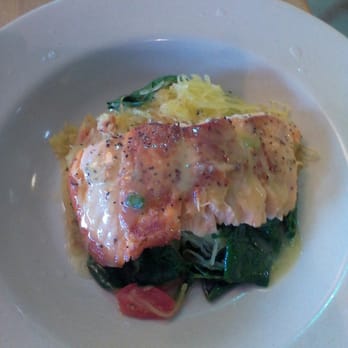 Central Market Cafe - Grill Atlantic salmon with spinach, tomatoes, and on a bed of noodles. - American Near Me - Austin, Texas Central Market Cafe - Grill Atlantic salmon with spinach, tomatoes, and on a bed of noodles. - American Near Me - Austin, Texas